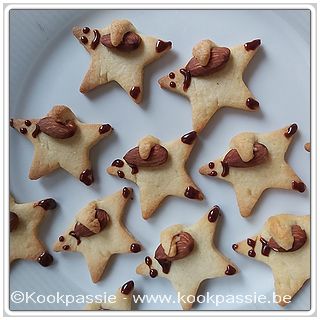 kookpassie.be - Sterkoekjes met amandel en chocoladeoogjes 1/2