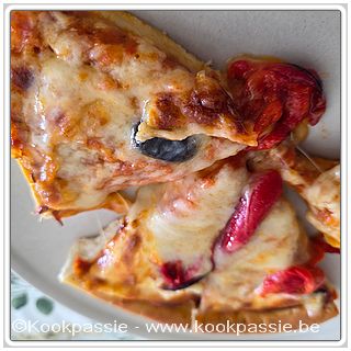kookpassie.be - Gepimpte pizza Aldi met geraspte mozzarella en zoete paprika uit de oven in Airfryer