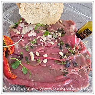 kookpassie.be - Delhaize: Rundcarpaccio met slagarnituur West Vlaams Rood (weinig smaak)